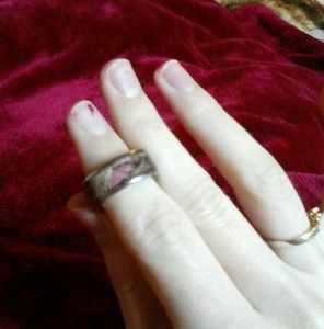 A pink camouflage ring size 6